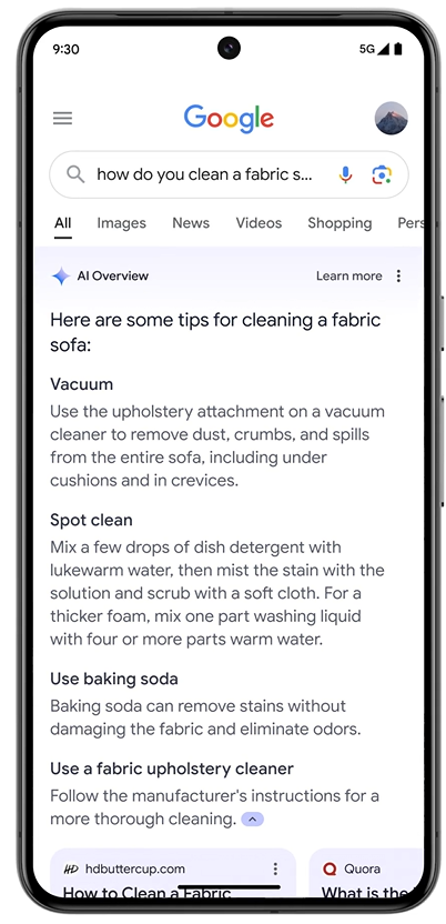 Google AI Overview search result mock up on a mobile device for "how do you clean a fabric sofa". 
